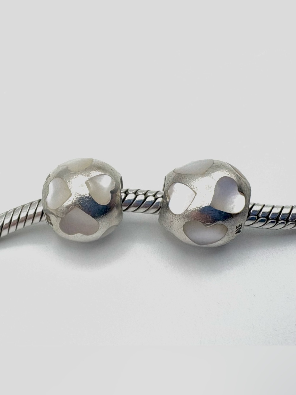Two Pandora Love Me Mother of Pearl Charms White Hearts